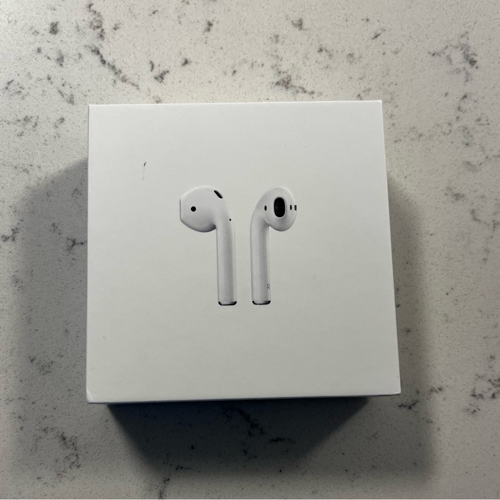 AirPods+ charger. Never been used. Free with laptop purchase and don’t need them